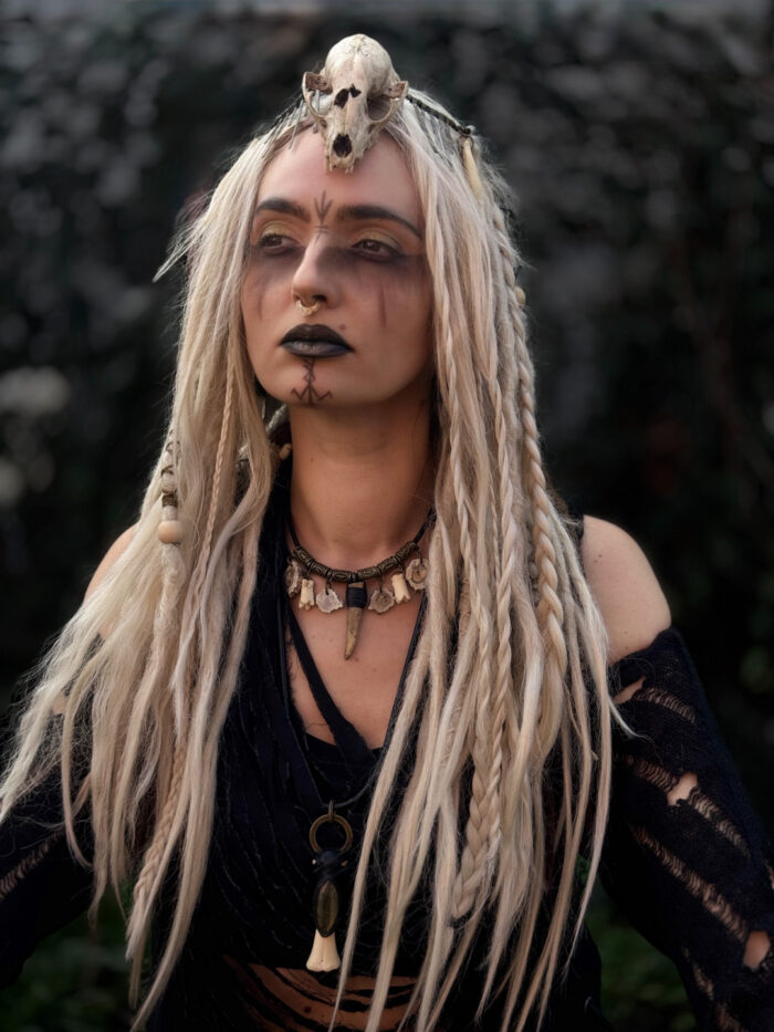 Tribal leather choker with rune and bone charms
